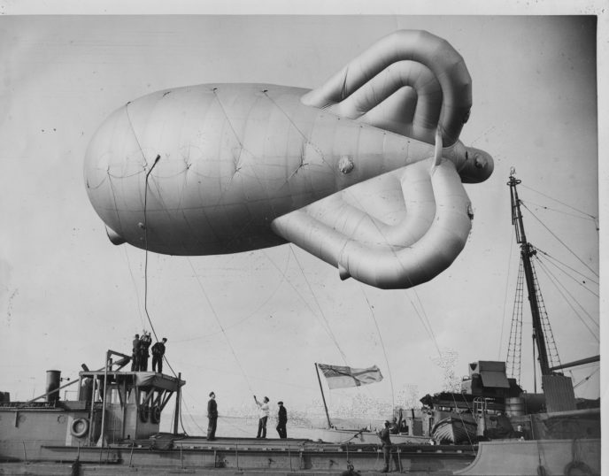 Barrage balloon being prepared on a vessel for D-Day landings