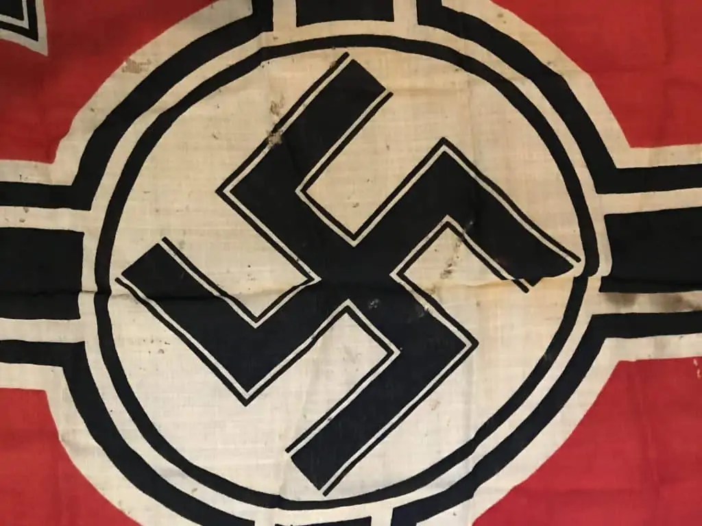 Close-up of the German NSDAP national war flag from WWII, part of a museum collection