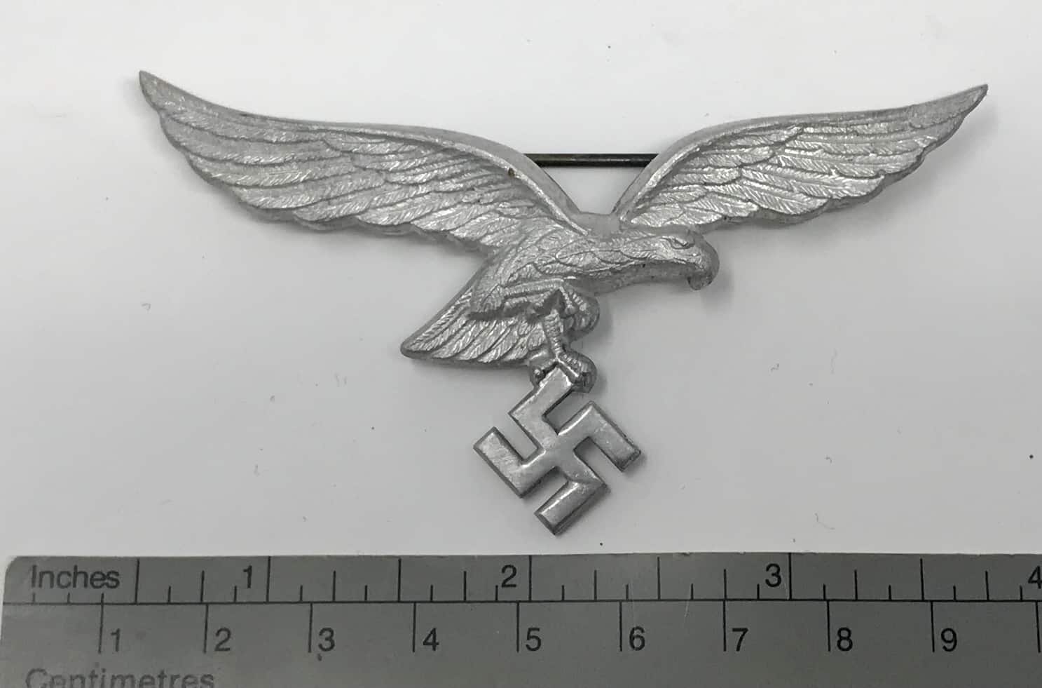 Discover Certified WWII German Tunic Eagle Relic by Assmann