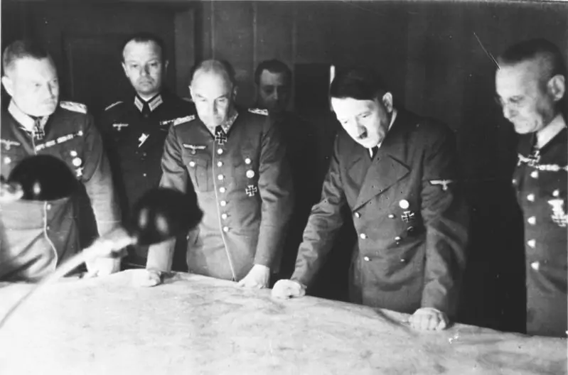 Hitler with General Keitel (far left) during a formal event
