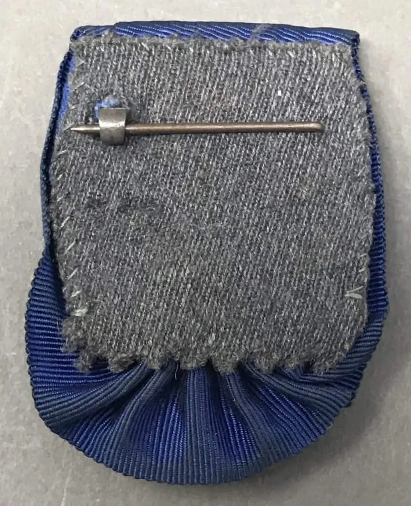 Detailed view of the German Wehrmacht Four-Year Long Service Medal with ribbon