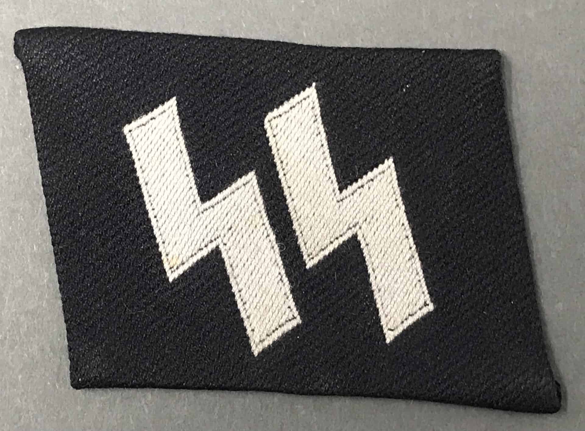 Authentic Waffen SS Collar Tab: A WWII Veteran