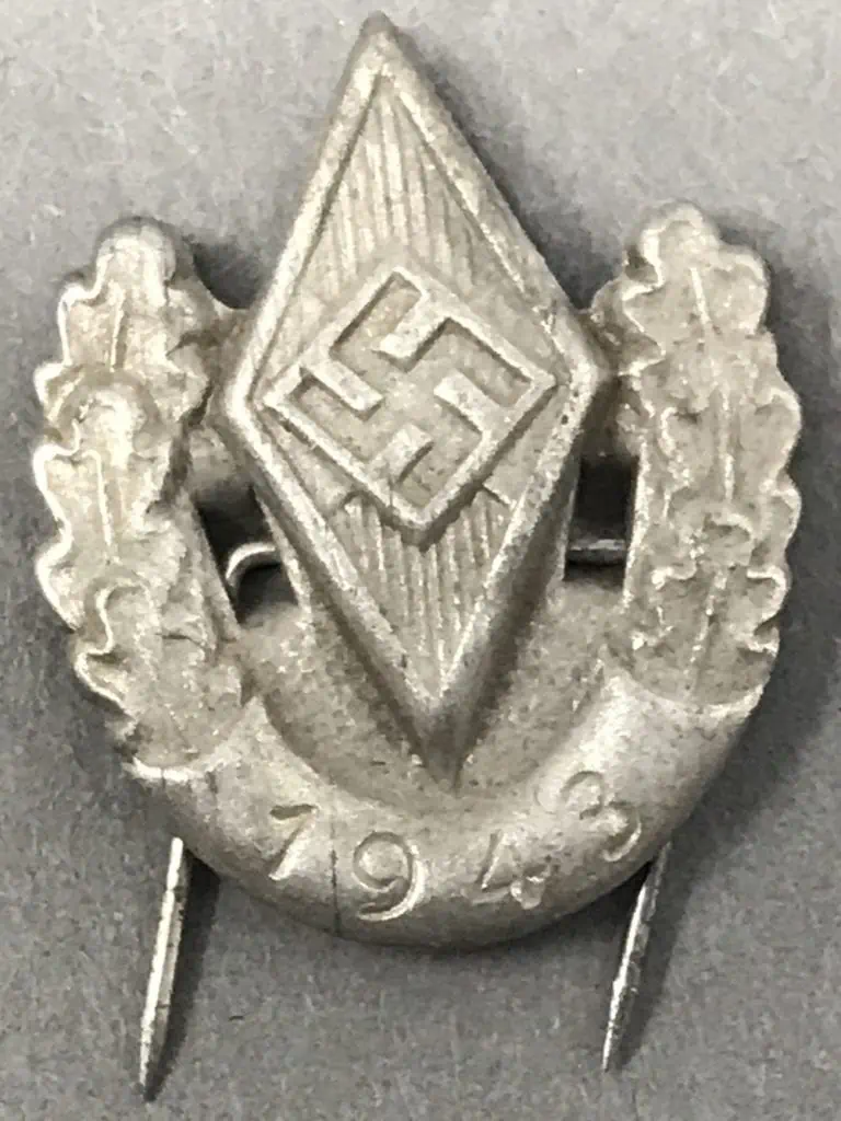 Reverse side of Hitler Youth 1943 sports award pin issued during Nazi Germany’s youth athletic competitions.