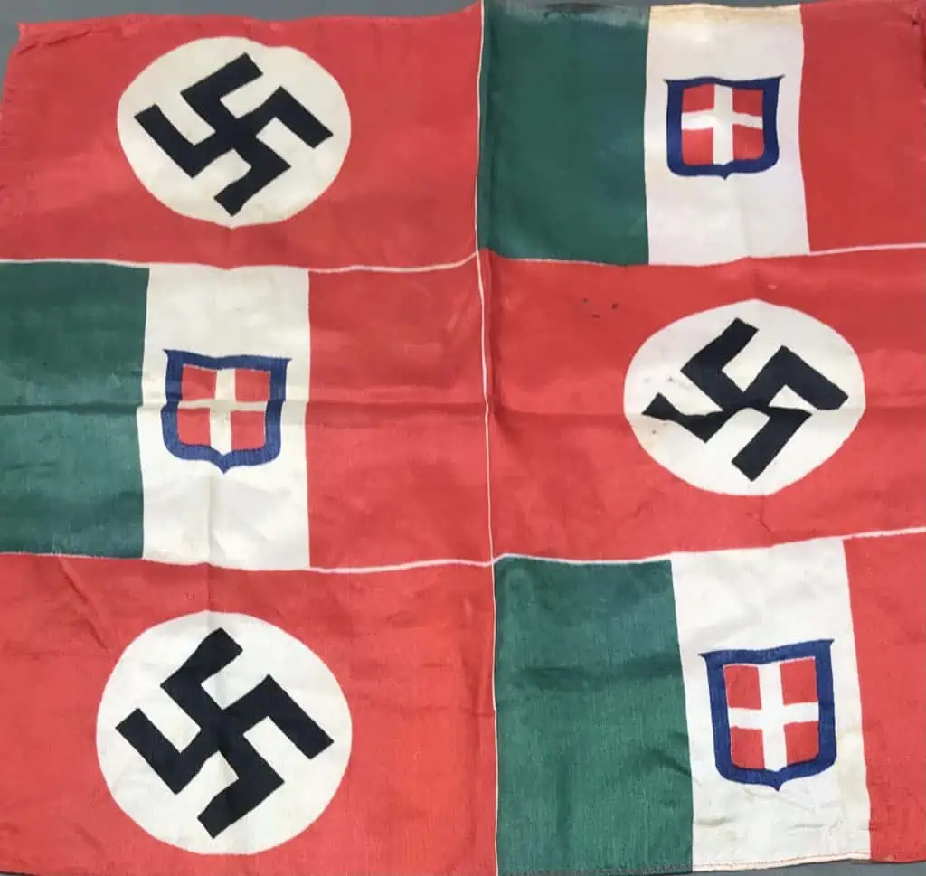 Close-up of Fascist Italian and Third Reich alliance flag showing details of symbols