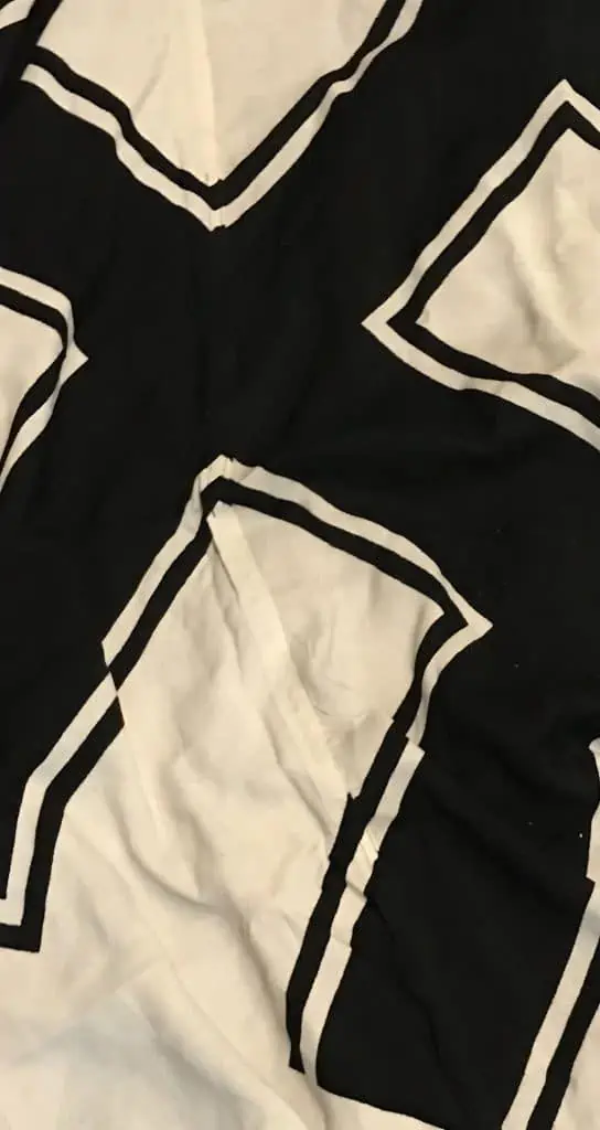 Detailed view of a Reichskriegsflagge, a WWII German Nazi national war flag, part of the museum’s collection
