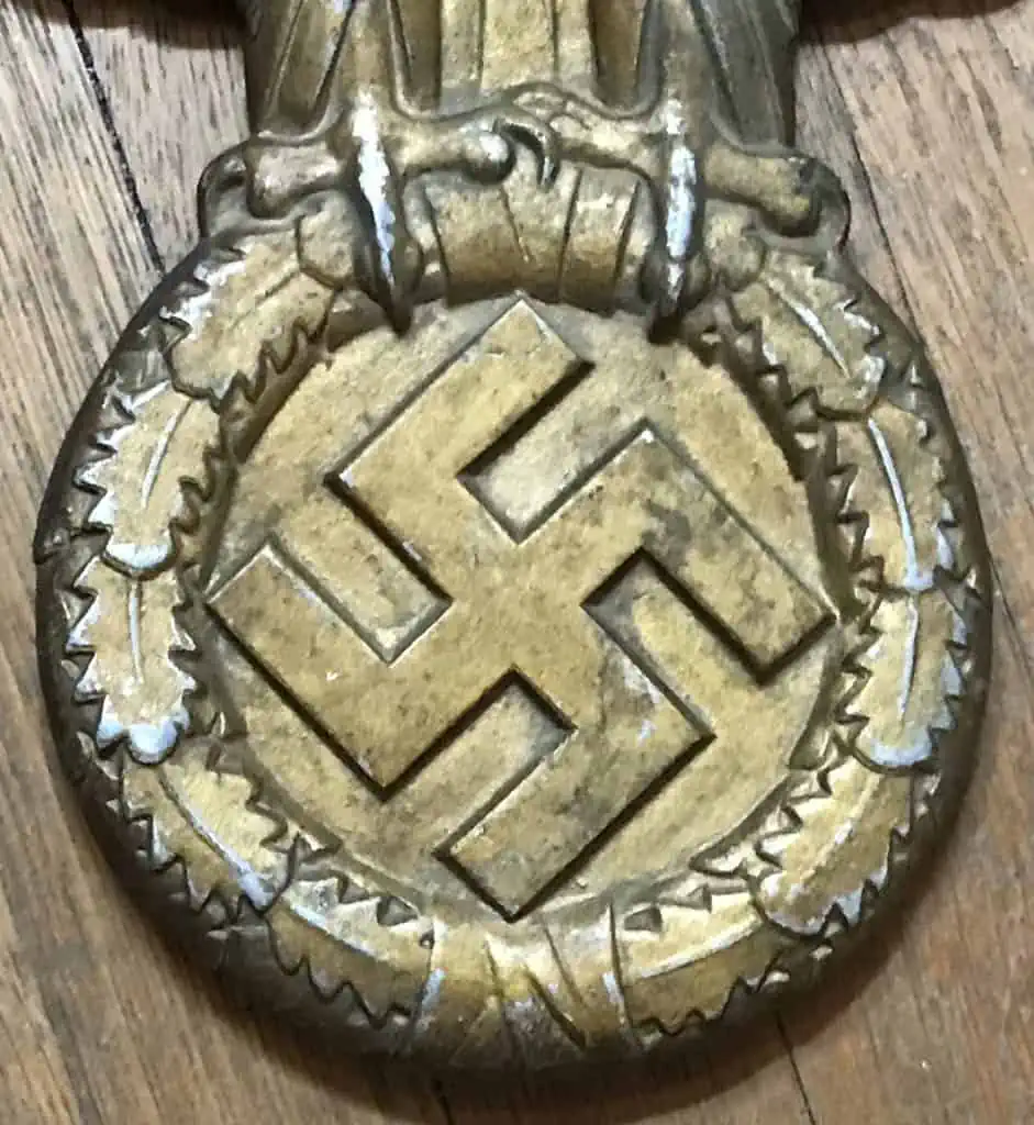 WWII German railroad eagle mounted on a display board