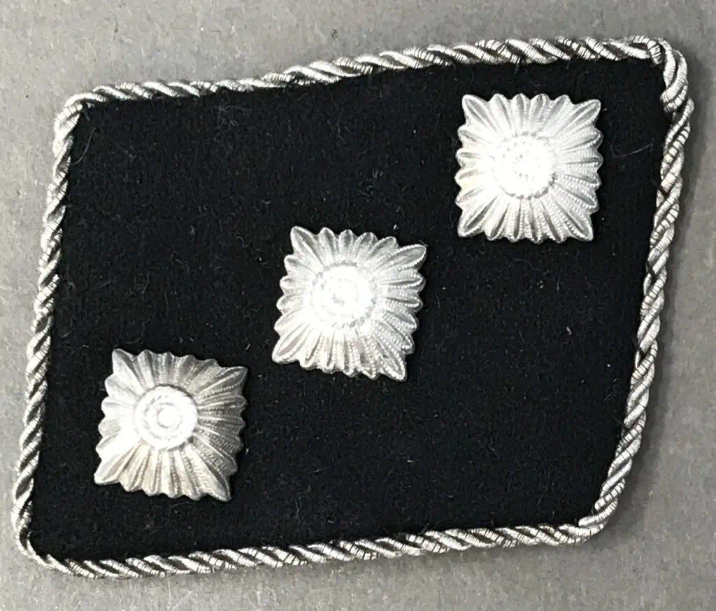 Close-up view of SS-Untersturmführer rank collar tab showing details