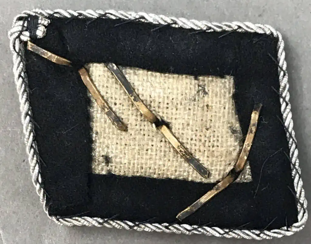 Back view of Waffen-SS Officer's collar tab showing stitching and construction