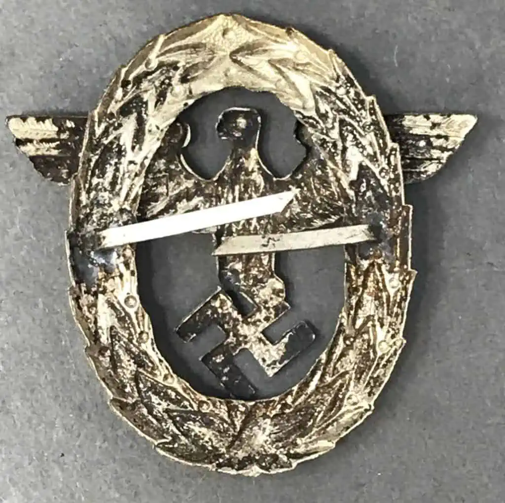 Detailed view of the Nazi police visor cap eagle, a Type 1 relic from WWII, certified by the museum