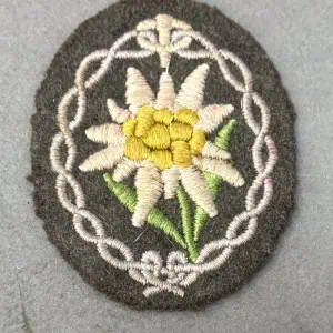 Original WWII German Army (Heer) MOUNTAIN TROOP SLEEVE EDELWEISS. (Gebirgsjäger Edelweiss Ärmelabzeichen) Certified